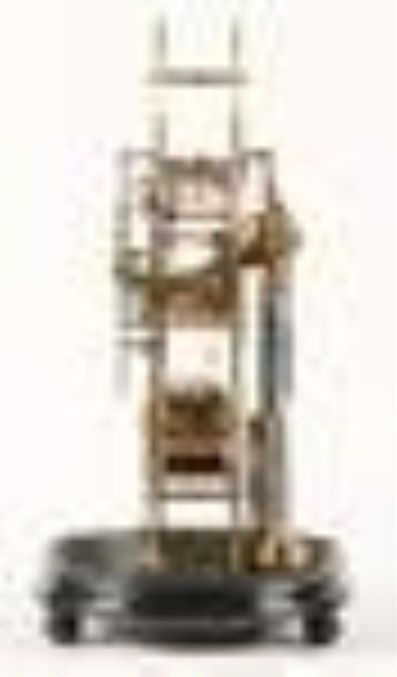 A good mid 19th century cathedral form skeleton clock attributed to Evans