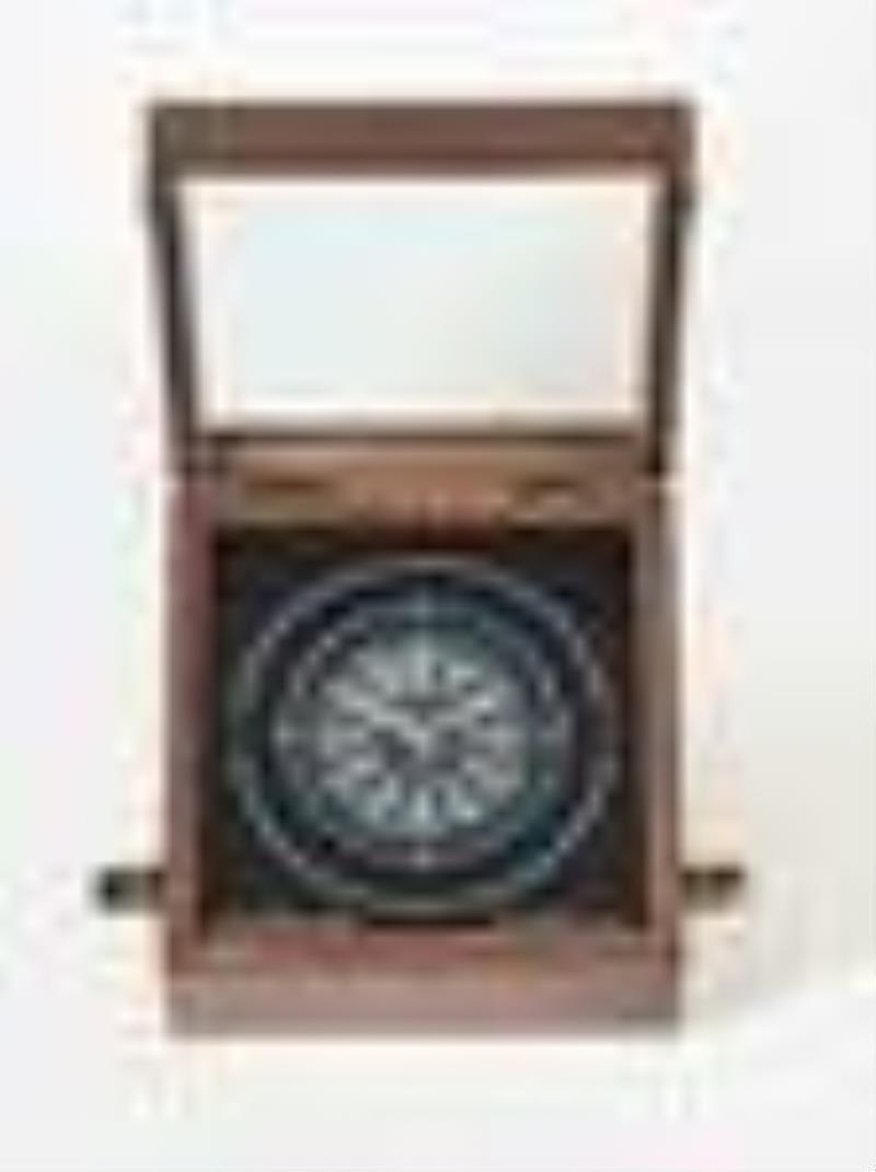 A Kelvin Hughes quartz chronometer desk clock by Patek Philippe