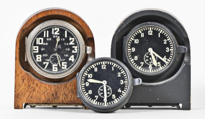 Three mid 20th century German military station clocks