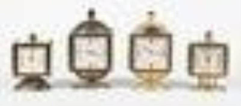 Four Swiss weather station clocks