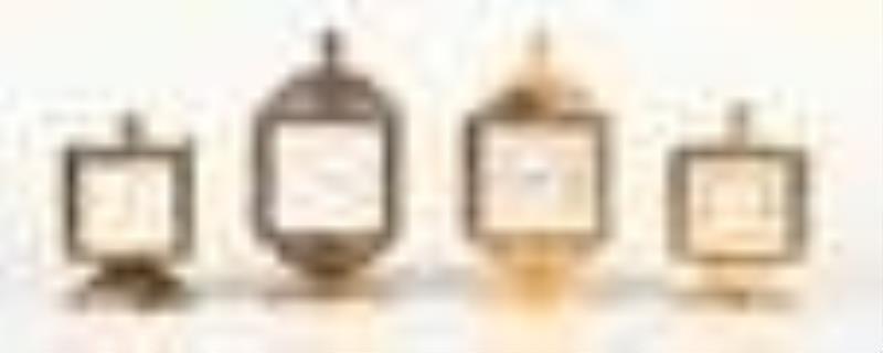 Four Swiss weather station clocks