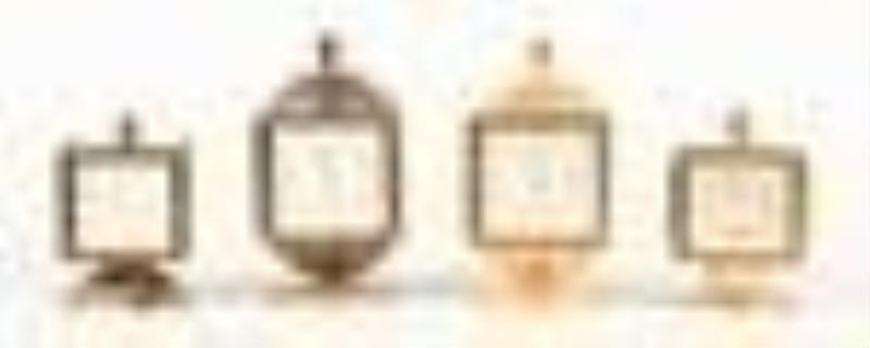 Four Swiss weather station clocks