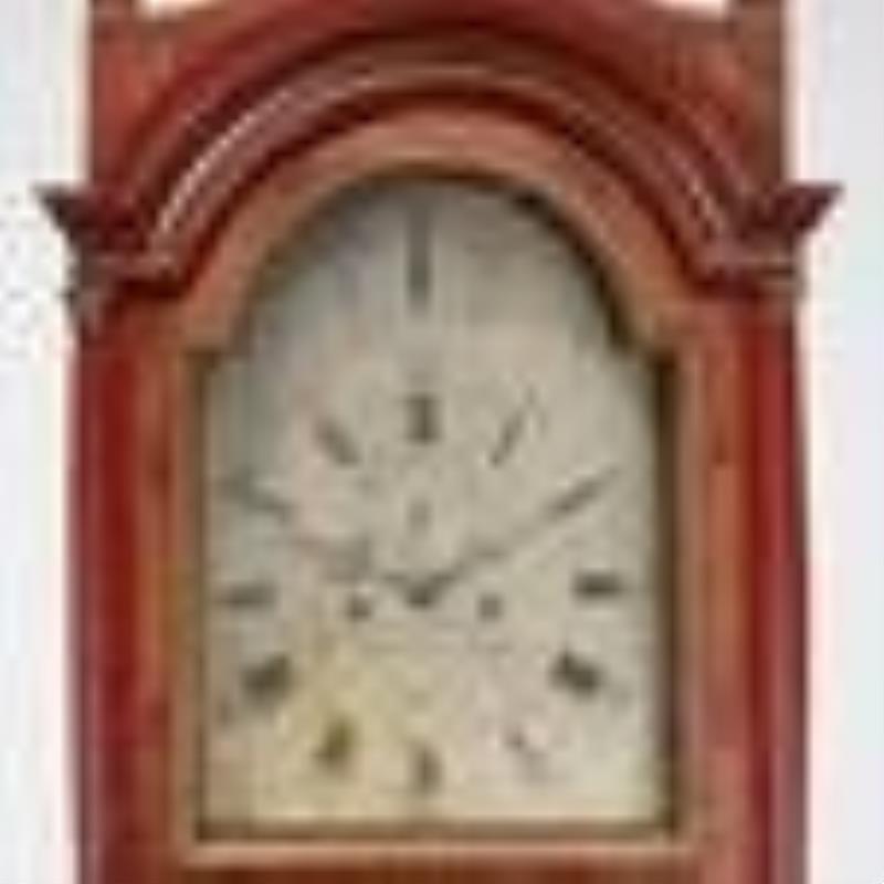 Red japanned tall clock supplied by Mario Buatta