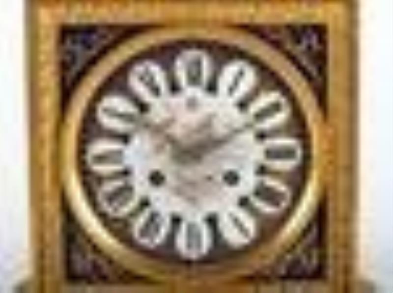 An L. Martie et Cie Sevres Style Ormolu and Polychrome Porcelain Clock