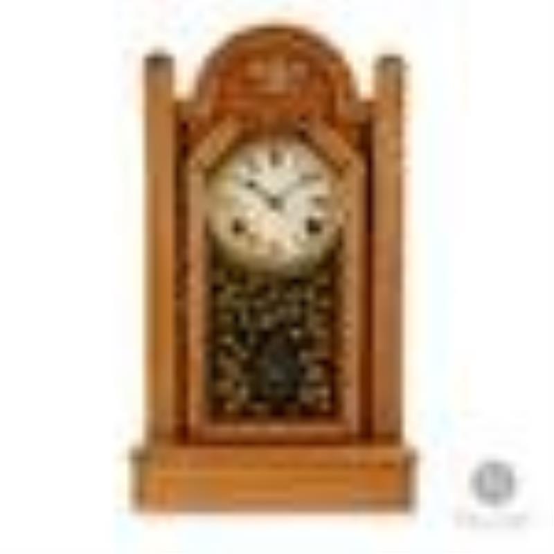 Pequegnat maple leaf mantel clock