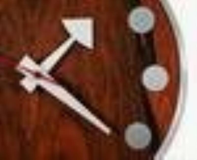 Arthur Umanoff Rosewood Howard Miller Wall Clock