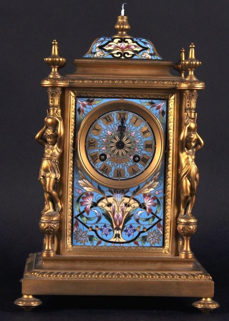A 19TH CENTURY FRENCH BRASS AND CHAMPLEVE ENAMEL CLOCK,