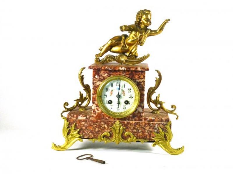 Marble Mantle clock with large putti on top