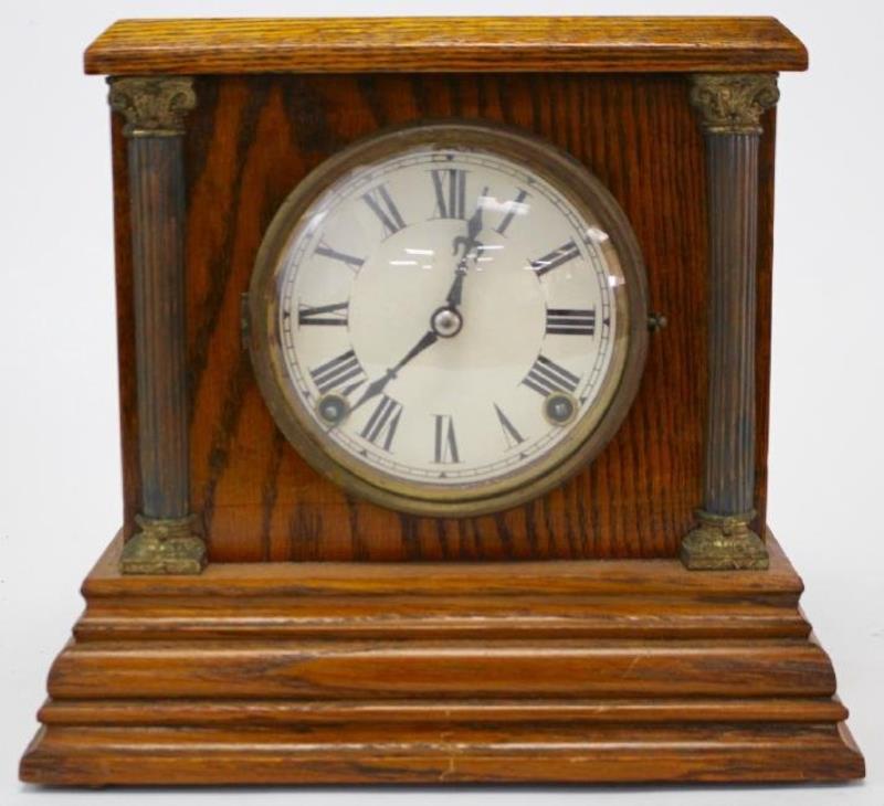 Early 20th century American stained Oak case mantel clock