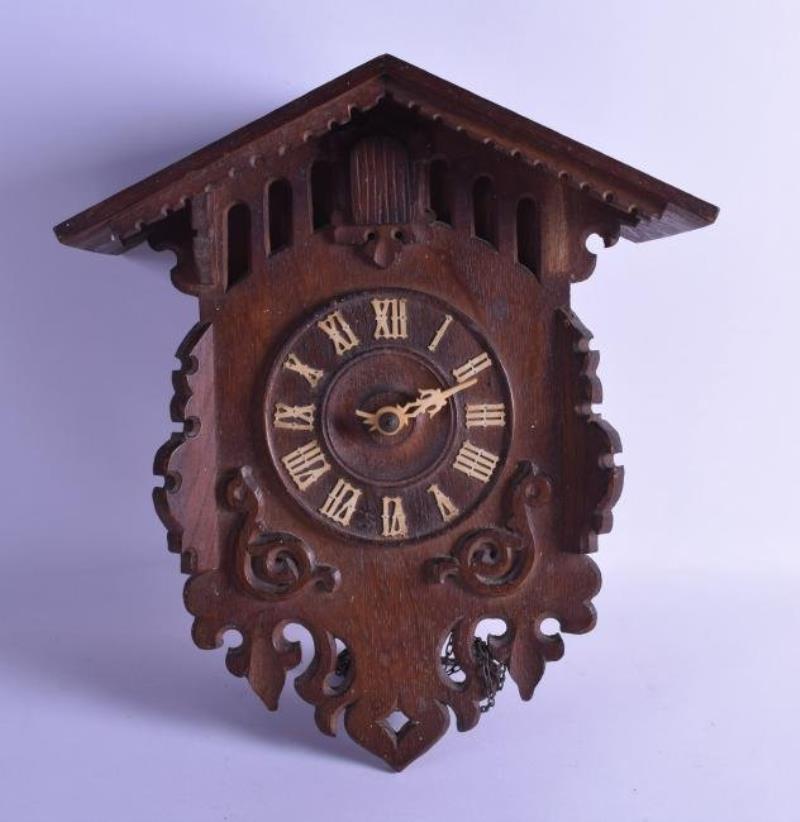A LATE 19TH CENTURY BLACK FOREST CUCKOO CLOCK the