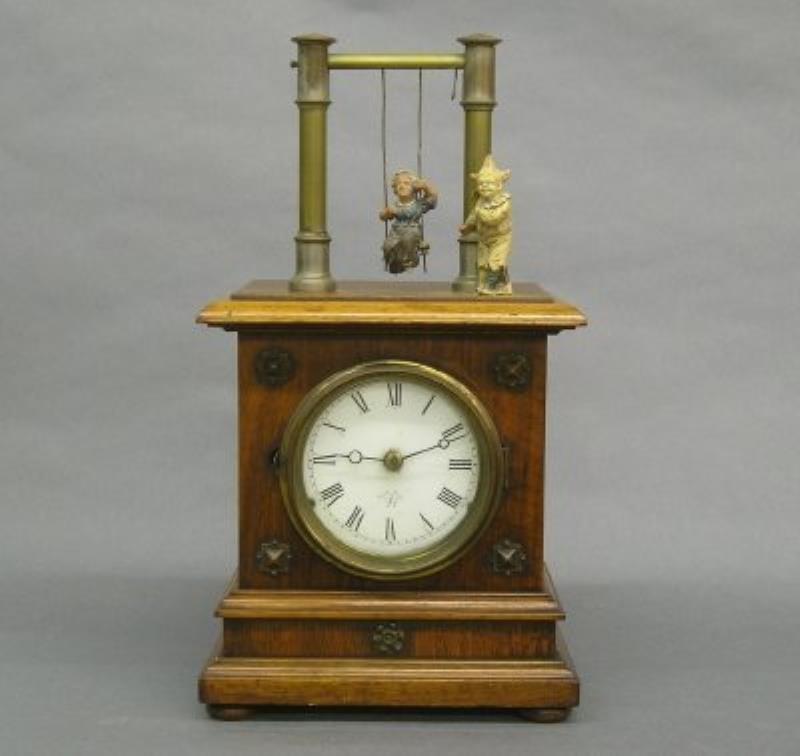 Junghans “Punch & Judy” shelf clock.