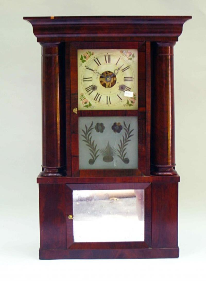 Hollow column clock by Clarke, Gilbert & Co.