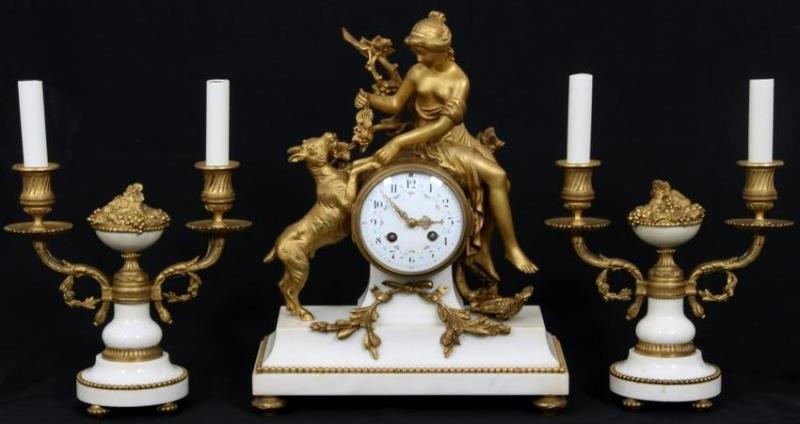 Three Piece French Gilt Bronze Figural Clock Set