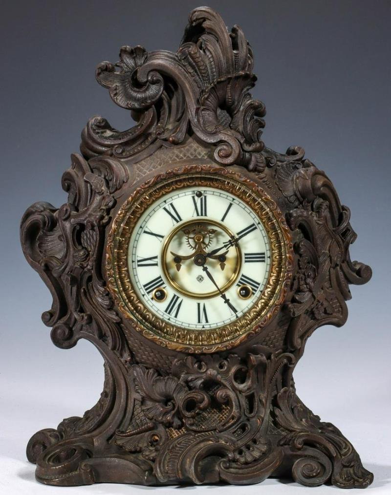 A VERY ORNATE ANSONIA CAST METAL ROCOCO STYLE CLOCK