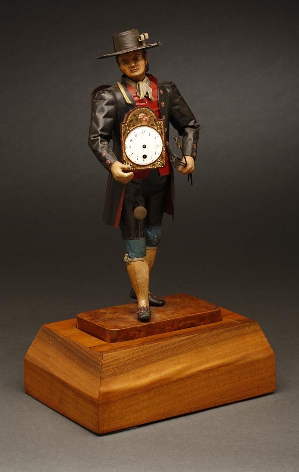 Austrian or German painted figural peddler clock