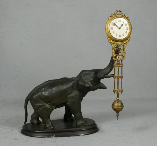 Junghans patinated white metal elephant swinger c