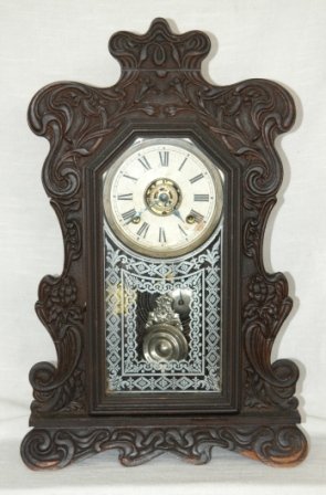 Ansonia Nouveau Floral Carved Cottage Clock. With