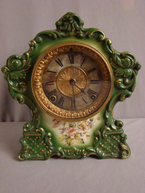 Ansonia porcelain “Tartar” shelf clock with floral