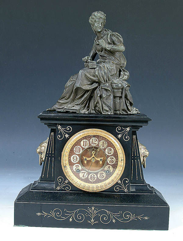A FINE VICTORIAN ANSONIA MANTLE in black enameled