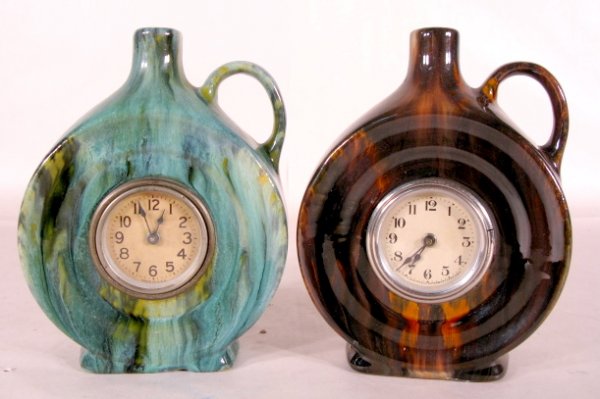 Pair of Mottled Pottery Clock Jugs