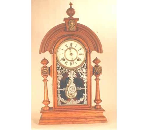 ANSONIA OAK “KING” SHELF CLOCK, C.1880.