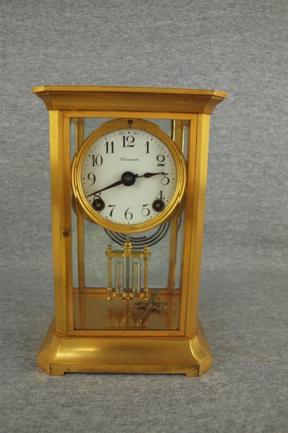 Ansonia anniversary style clock with mercury pendulum,