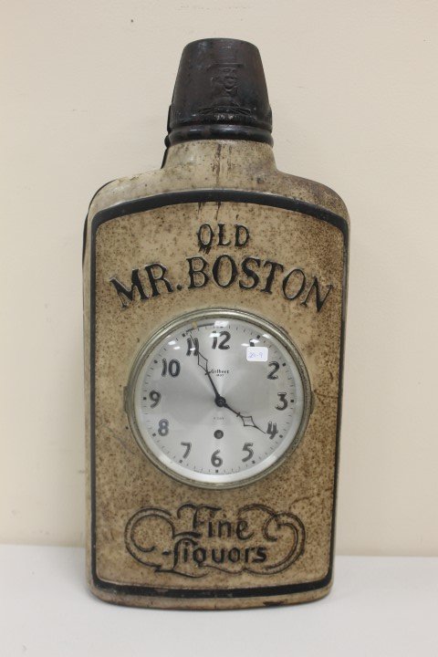 Gilbert “Old Mr. Boston Fine Liquors” metal bottle