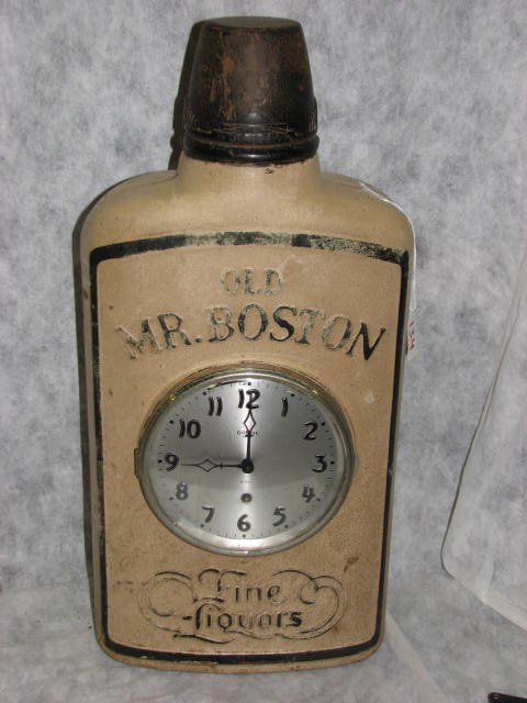 Gilbert metal case clock w/Mr. Boston advertizing
