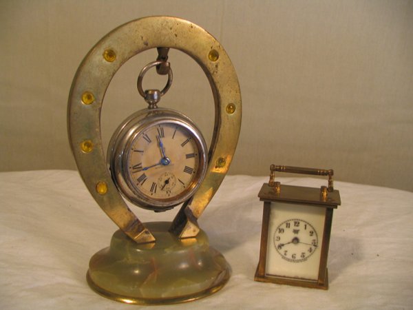Waterbury horsehose and onyx base pocket watch hol