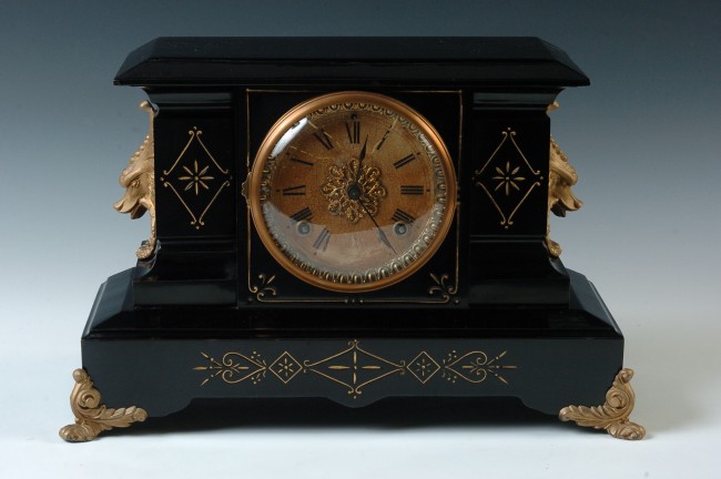 AN ANSONIA ‘PALERMO’ METAL MANTEL CLOCK