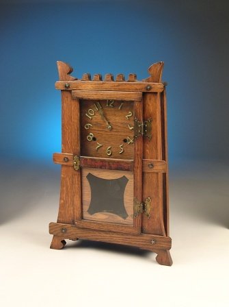 A MISSION PERIOD OAK EIGHT DAY STRIKING CLOCK by t