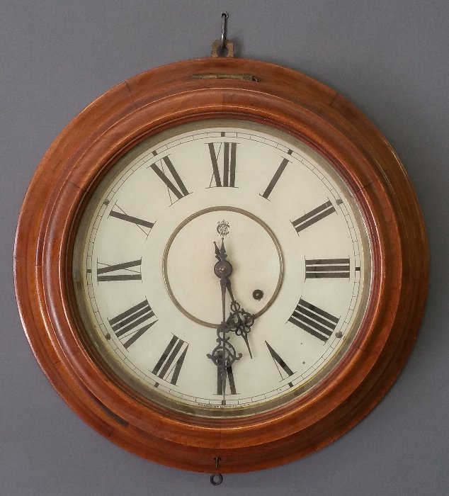 Waterbury Clock Company round mahogany cased gallery