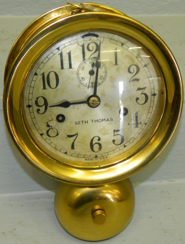 Seth Thomas ship’s clock with bell.