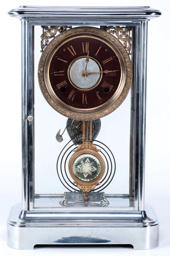 AN ANSONIA ‘SYMBOL’ NICKEL PLATED CRYSTAL REGULATOR