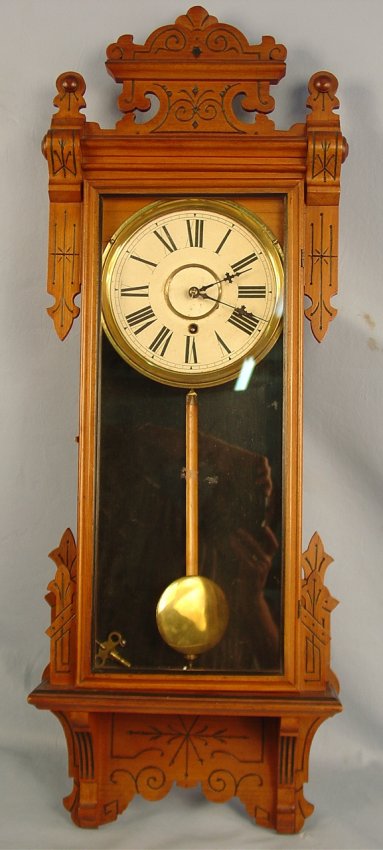 Gilbert Thespian Clock, ca. 1910, 38in. T, 13in. W,